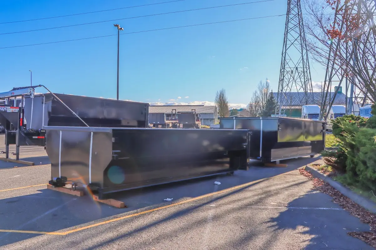 Roll-off dumpster ready for waste disposal at job site for Yard Waste Dumpster Rental in Royse City